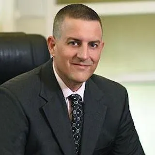 Lawyer Gregory H. Comings