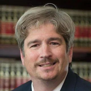 Lawyer Mr. Eric A. Ballinger