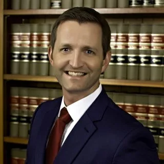 Lawyer Gregory P. Holcomb