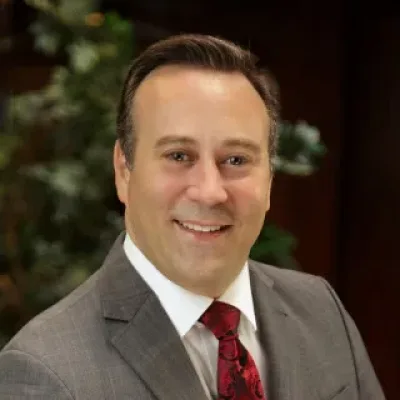 Evan E. Zelig - Attorney