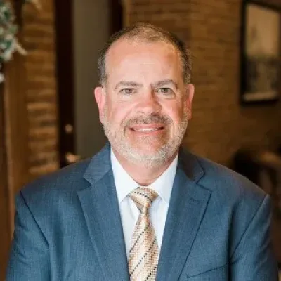 Bruce W. Akerly - Attorney