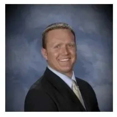 Theodore W. Buselmeier - Attorney