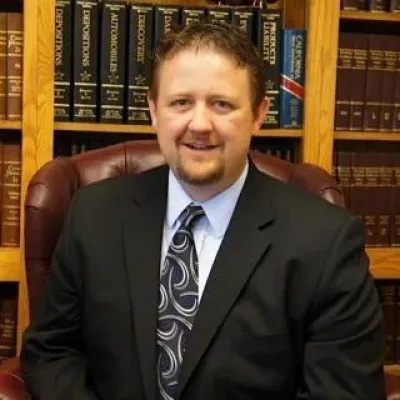 Travis Christiansen - Attorney