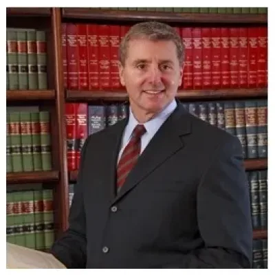 John Tumelty - Attorney