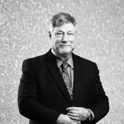 Michael E. Manely - Attorney